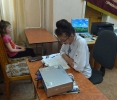 Виктория Визитив, сотрудник Централизованной клубной системы, на встрече с читателями в библиотеке № 9 поселка Рудничный