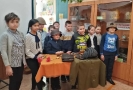 Участники урока истории, посвящённого Дню Героев Отечества в библиотеке № 9 посёлка Рудничный