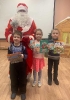 Участники новогодних мероприятий в центральной детской библиотеке получили подарки от Деда Мороза
